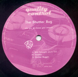 The Shutter Bug Asks You To Choose Your Weapon QCON 006